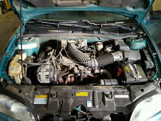 1G1JF5244V7124490 - 1997 CHEVROLET CAVALIER L GREEN photo 7