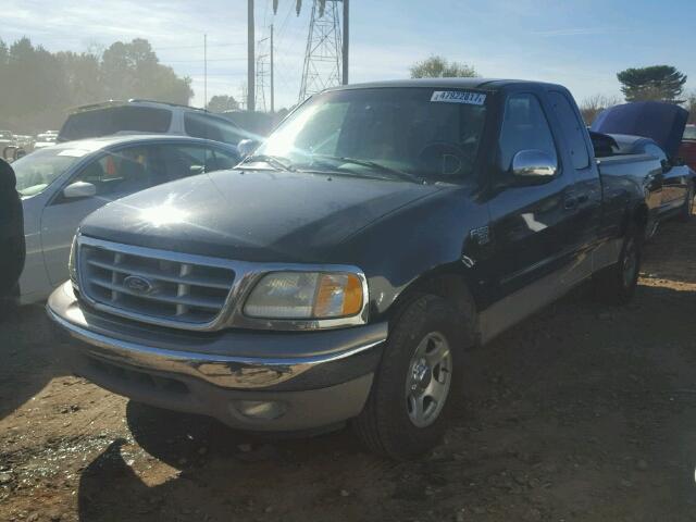 1FTRX17L3YNA82099 - 2000 FORD F150 BLACK photo 2