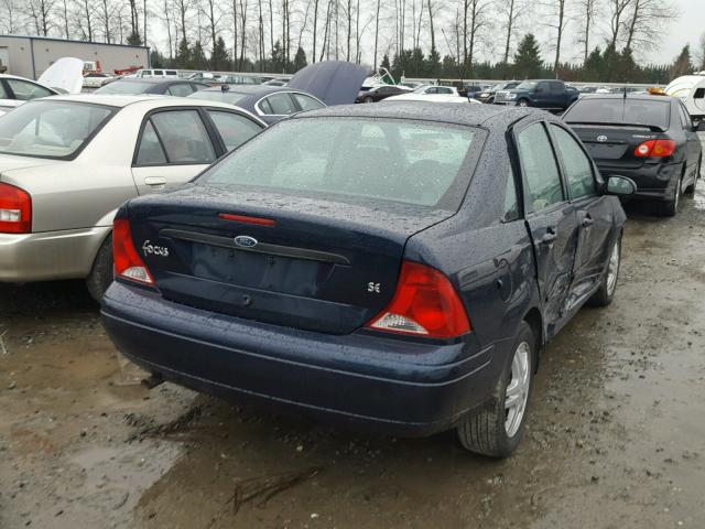 1FAFP34382W162587 - 2002 FORD FOCUS SE BLUE photo 4