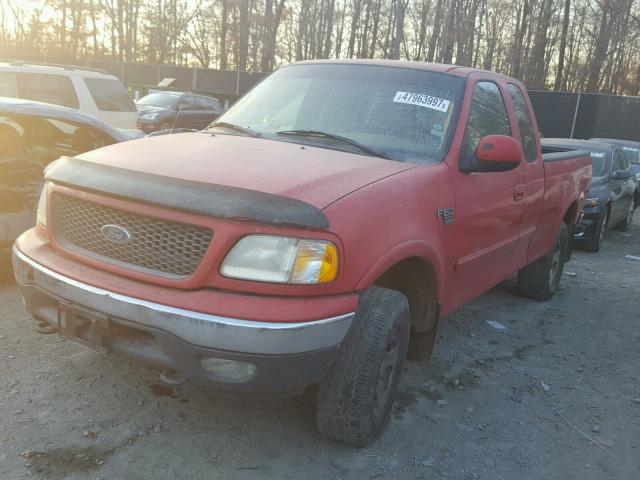 1FTRX18L6YNA80393 - 2000 FORD F150 RED photo 2