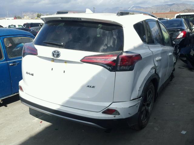 JTMWFREV6HJ710012 - 2017 TOYOTA RAV4 XLE WHITE photo 4