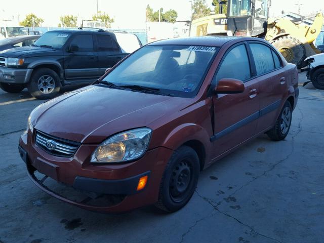 KNADE223696443105 - 2009 KIA RIO BASE ORANGE photo 2