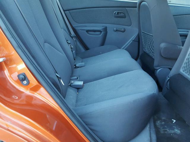 KNADE223696443105 - 2009 KIA RIO BASE ORANGE photo 6