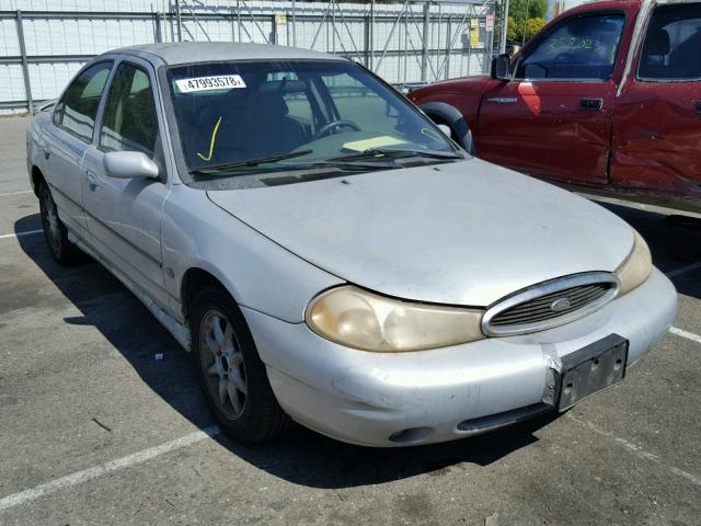 1FAFP66L4XK176080 - 1999 FORD CONTOUR SE SILVER photo 1