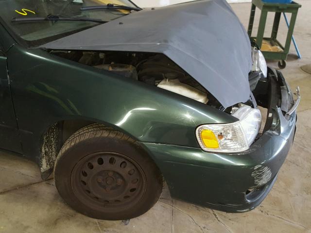 2T1BR12EX2C570299 - 2002 TOYOTA COROLLA CE GREEN photo 9