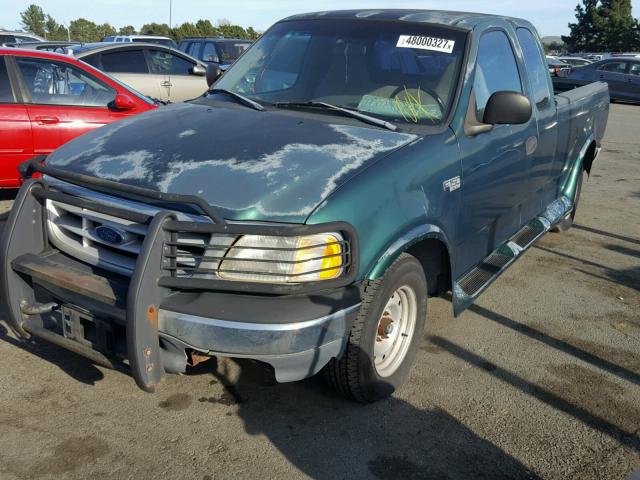 1FTZX1725XKA28844 - 1999 FORD F150 GREEN photo 2