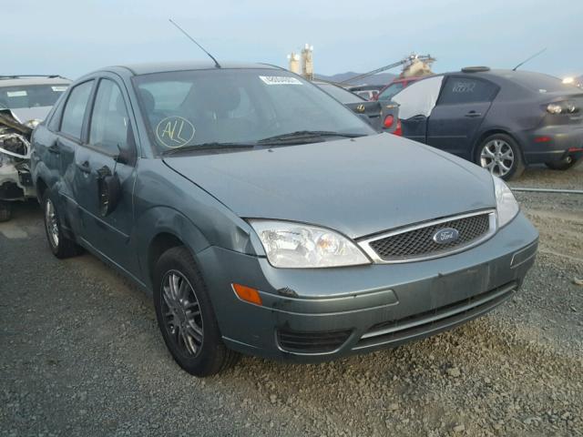 1FAFP34N15W142333 - 2005 FORD FOCUS ZX4 GREEN photo 1