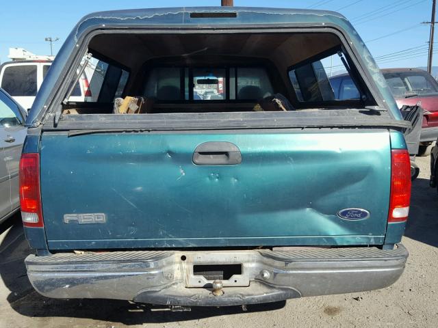 2FTZF1722WCA80308 - 1998 FORD F150 GREEN photo 9