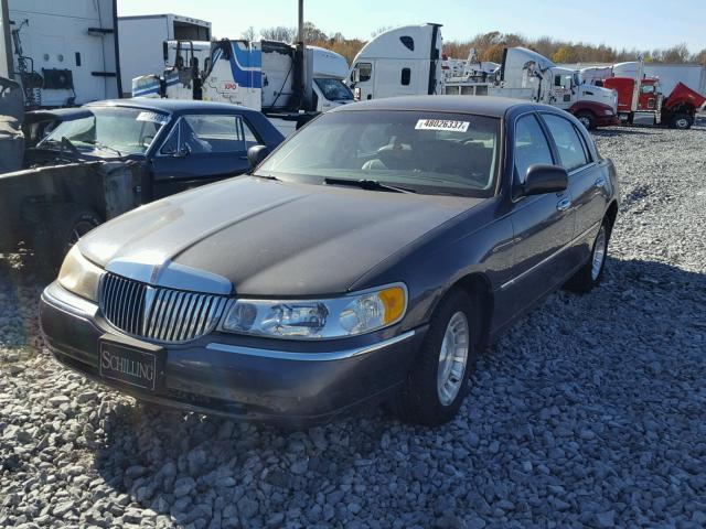 1LNHM81W3XY684705 - 1999 LINCOLN TOWN CAR E CHARCOAL photo 2