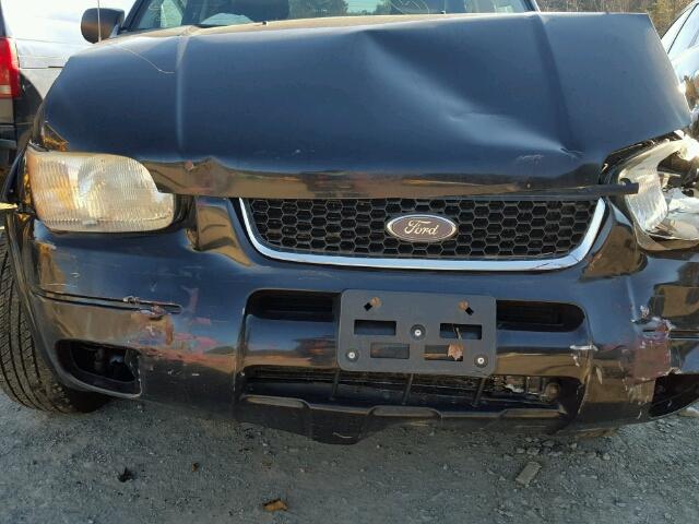 1FMCU94174KB42585 - 2004 FORD ESCAPE LIM BLACK photo 7