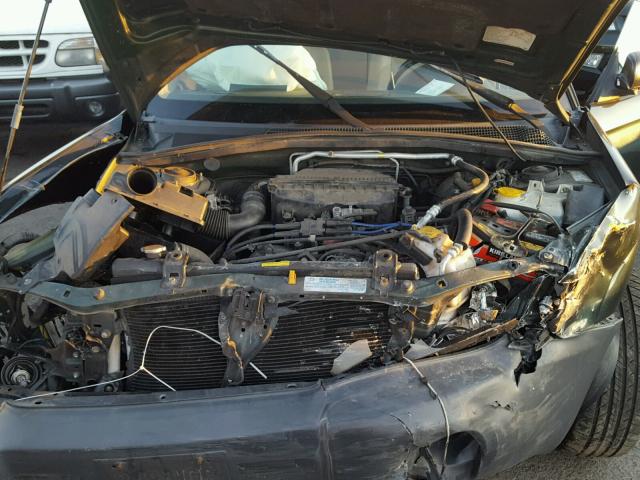 JF1SG63624H733445 - 2004 SUBARU FORESTER 2 GREEN photo 7