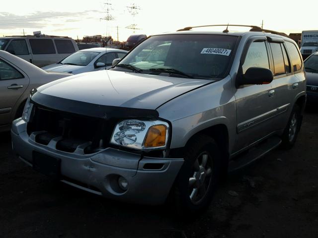 1GKDT13SX42124464 - 2004 GMC ENVOY SILVER photo 2