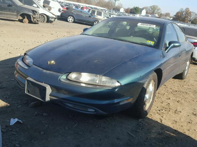 1G3GR62C8V4112706 - 1997 OLDSMOBILE AURORA GREEN photo 2