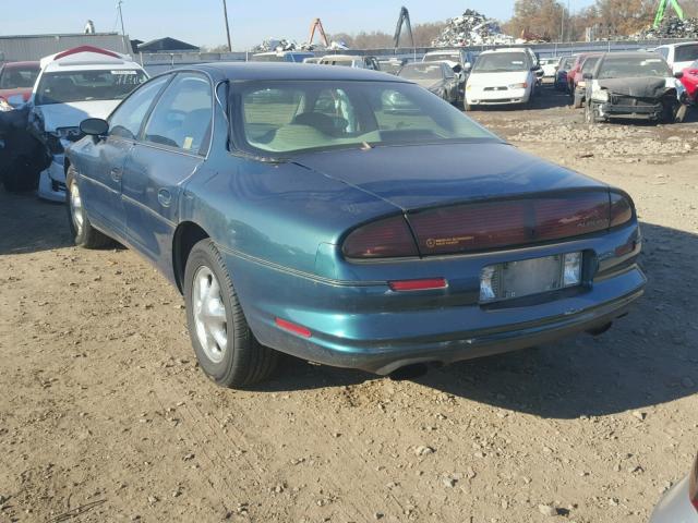 1G3GR62C8V4112706 - 1997 OLDSMOBILE AURORA GREEN photo 3