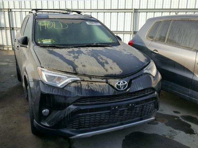 2T3NFREVXGW248842 - 2016 TOYOTA RAV4 SE BLACK photo 1