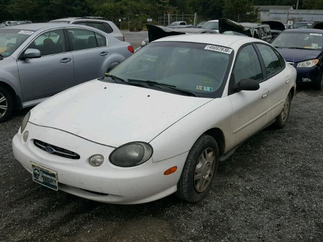 1FAFP52U0XG255497 - 1999 FORD TAURUS LX WHITE photo 2