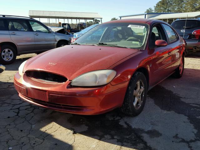 1FAFP55S6YA275025 - 2000 FORD TAURUS SES RED photo 2