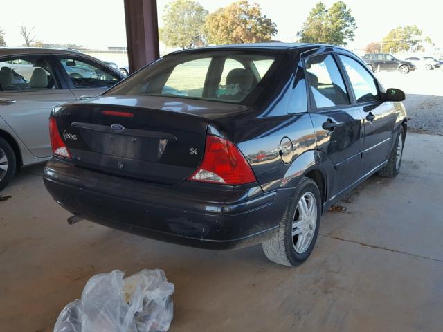 1FAFP34P62W357185 - 2002 FORD FOCUS SE BLACK photo 4