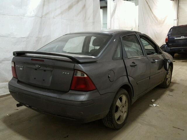 1FAHP34N36W190720 - 2006 FORD FOCUS ZX4 GRAY photo 4