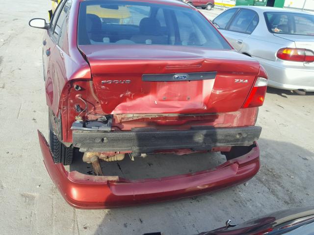1FAFP34N75W129635 - 2005 FORD FOCUS ZX4 RED photo 9