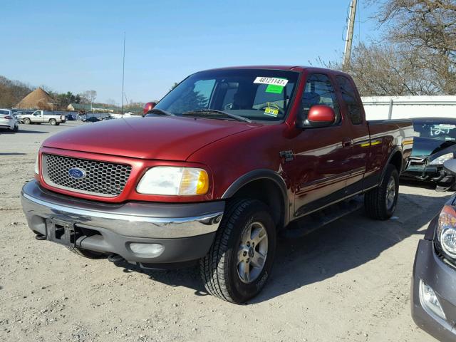 1FTRX18L12NB47909 - 2002 FORD F150 RED photo 2