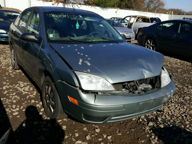 1FAFP34N25W174904 - 2005 FORD FOCUS ZX4 GREEN photo 1