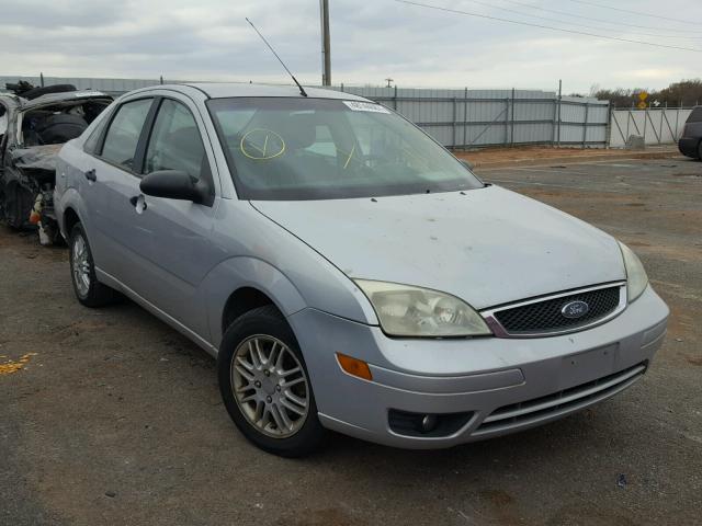 1FAHP34N57W142167 - 2007 FORD FOCUS ZX4 SILVER photo 1