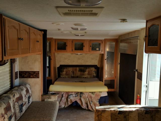 4YDT2822X96412079 - 2009 KEYSTONE PASSPORT WHITE photo 7