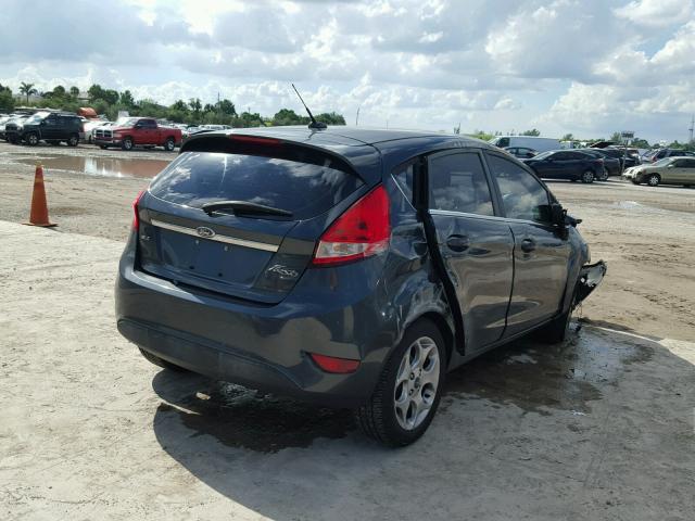 3FADP4FJ3BM179130 - 2011 FORD FIESTA SES BLUE photo 4