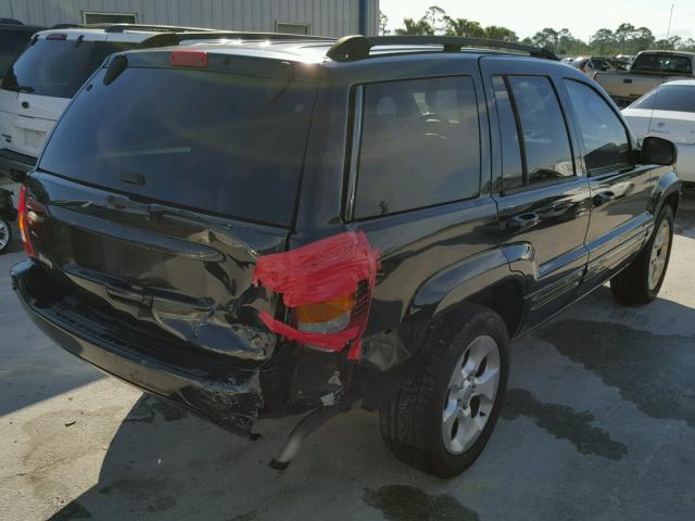 1J4GX58S74C130868 - 2004 JEEP GRAND CHER BLACK photo 4