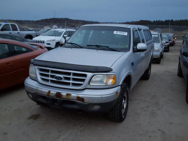 2FTRX18W32CA61288 - 2002 FORD F150 SILVER photo 2