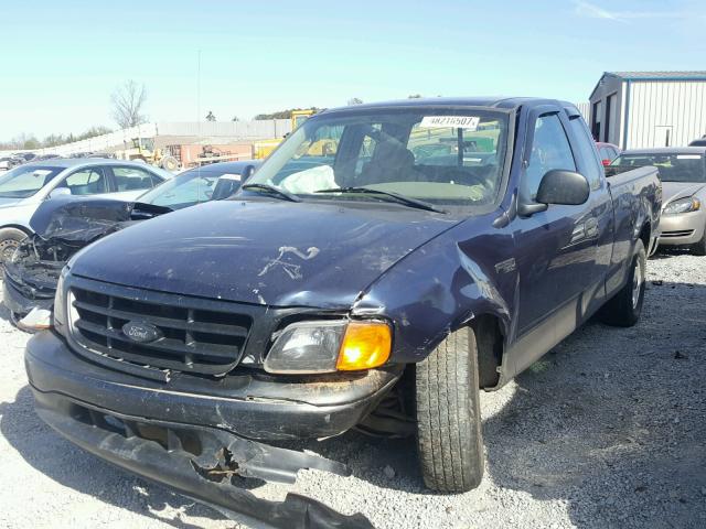 2FTRX17204CA18576 - 2004 FORD F-150 HERI BLUE photo 2