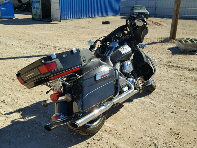 1HD1KEM16DB668635 - 2013 HARLEY-DAVIDSON FLHTK ELEC BLACK photo 4