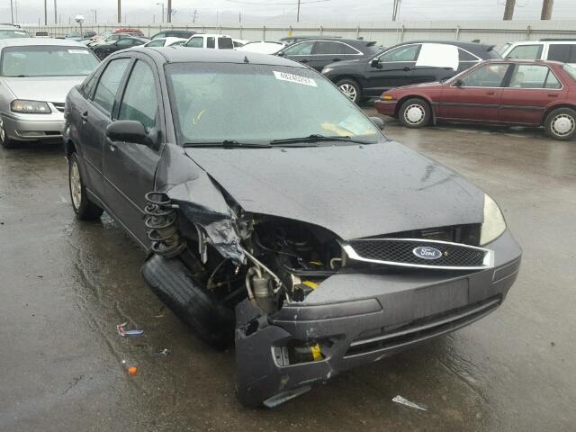 1FAFP34N75W296125 - 2005 FORD FOCUS ZX4 GRAY photo 1