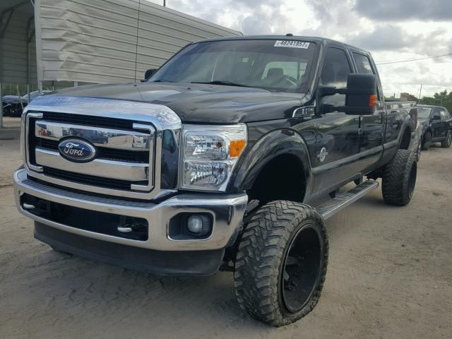 1FT8W3BT0BEC60432 - 2011 FORD F350 SUPER BLACK photo 2