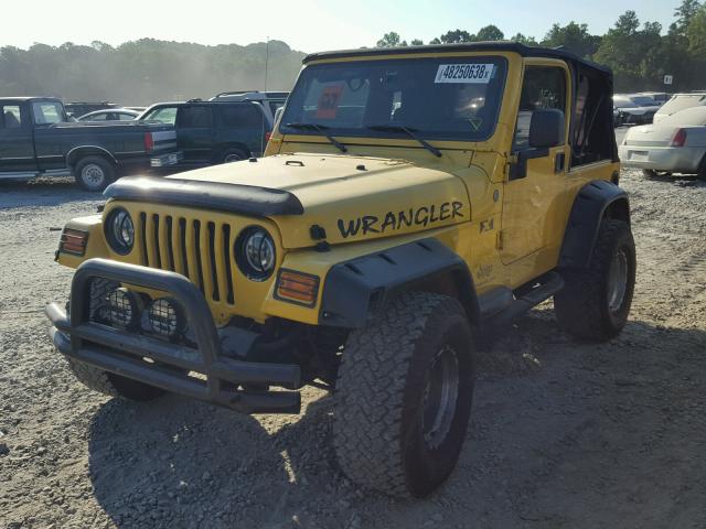 1J4FA39S24P797579 - 2004 JEEP WRANGLER X YELLOW photo 2