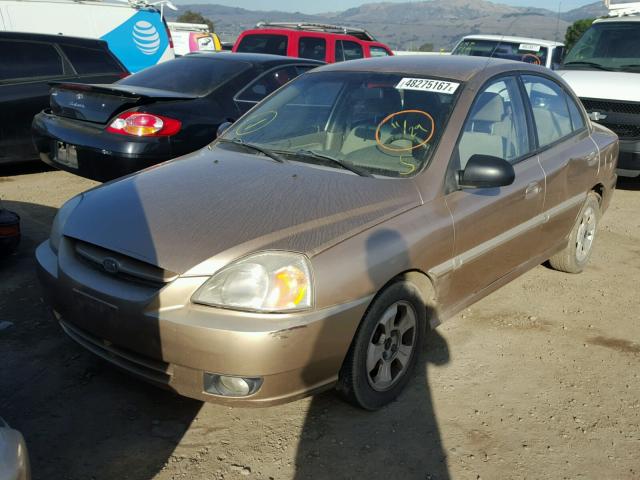 KNADC125936278613 - 2003 KIA RIO GOLD photo 2