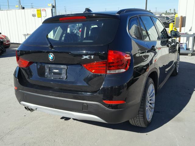 WBAVM1C5XFV317607 - 2015 BMW X1 SDRIVE2 BLACK photo 4