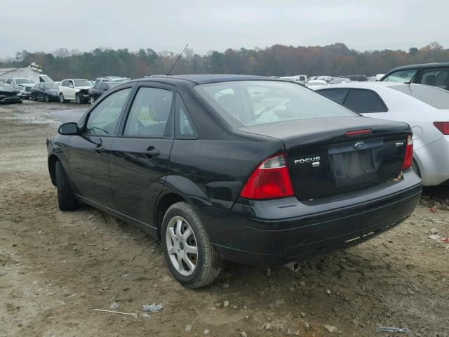 1FAFP34N95W267435 - 2005 FORD FOCUS ZX4 BLACK photo 3