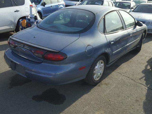 1FAFP53U2XG194023 - 1999 FORD TAURUS SE BLUE photo 4