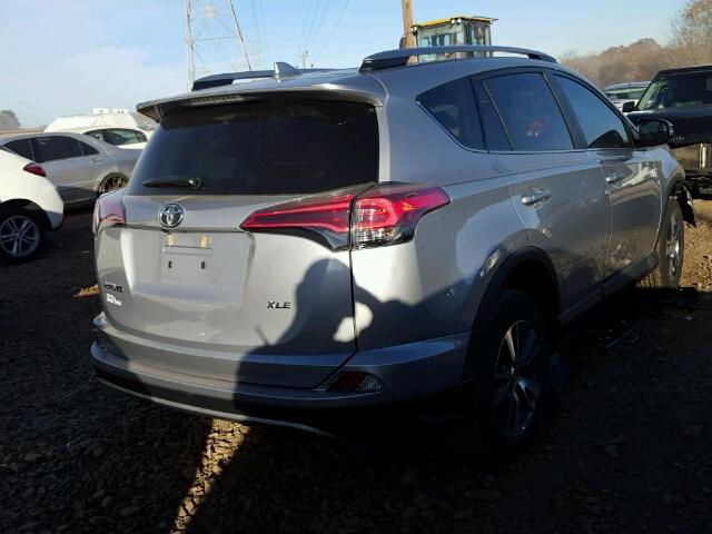 2T3WFREV0HW358658 - 2017 TOYOTA RAV4 XLE SILVER photo 4