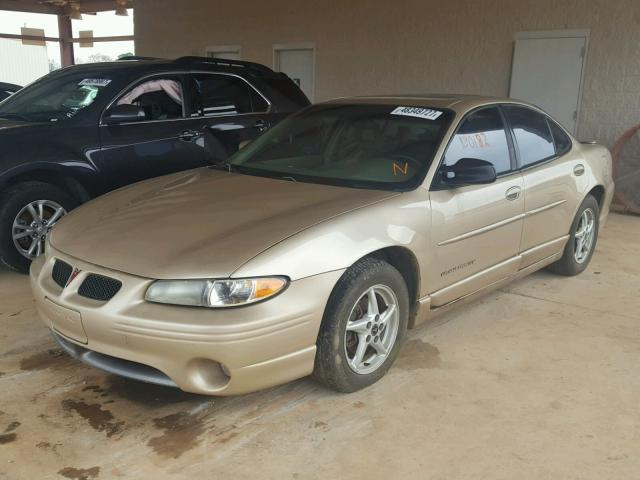 1G2WP52K31F224092 - 2001 PONTIAC GRAND PRIX GOLD photo 2