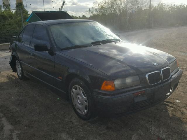 WBACC0322WEK26938 - 1998 BMW 318 I AUTO BLACK photo 1