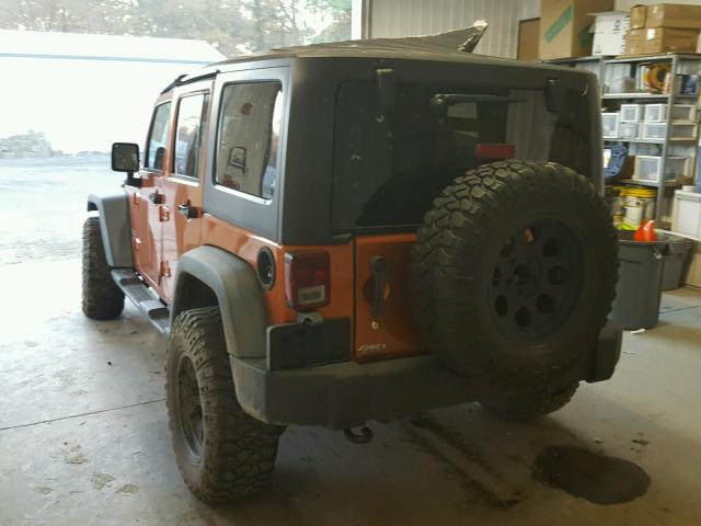 1J4BA3H16BL525581 - 2011 JEEP WRANGLER U ORANGE photo 3