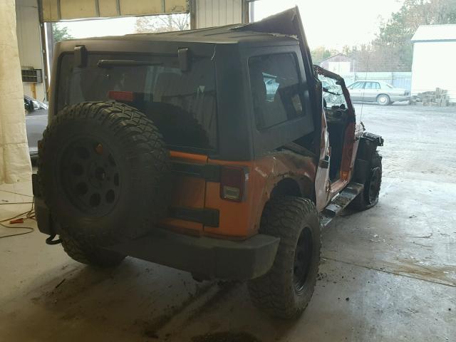 1J4BA3H16BL525581 - 2011 JEEP WRANGLER U ORANGE photo 4