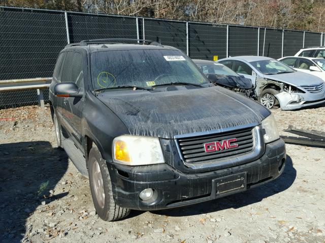 1GKDT13SX42182638 - 2004 GMC ENVOY BLACK photo 1