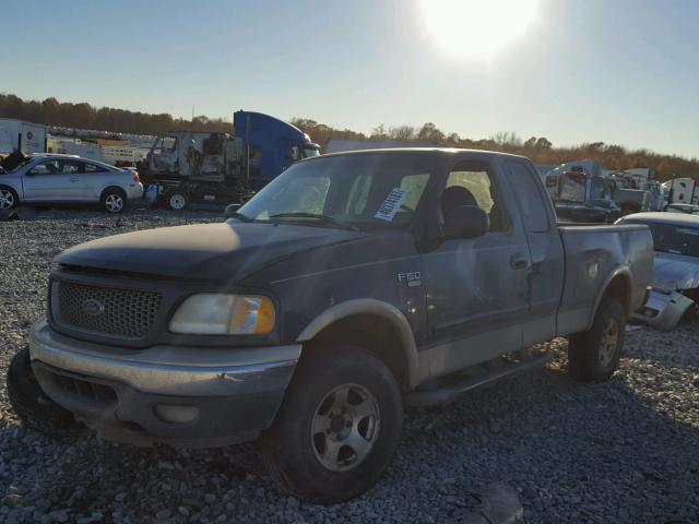 2FTRX18L7XCA69164 - 1999 FORD F150 BLACK photo 2