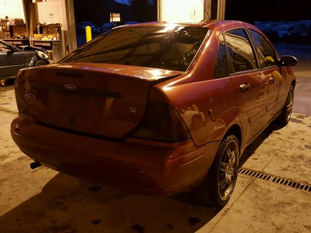 1FAFP34P23W302735 - 2003 FORD FOCUS SE MAROON photo 4