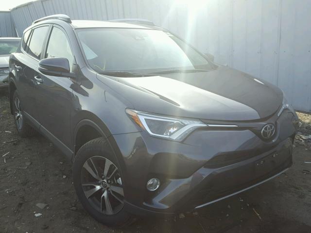 JTMRFREV9HJ173973 - 2017 TOYOTA RAV4 XLE GRAY photo 1