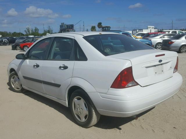 1FAFP33P24W189596 - 2004 FORD FOCUS LX WHITE photo 3